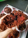 Homemade chocolate chip muffin in polkadot cup