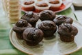 Homemade chocolate cupcakes on round tray