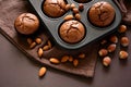 Homemade chocolate muffins brownies with cinnamon, almonds and hazelnuts Royalty Free Stock Photo