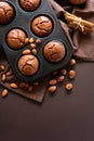 Homemade chocolate muffins brownies with cinnamon, almonds and hazelnuts Royalty Free Stock Photo