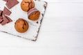 Homemade chocolate muffins on a wooden board Royalty Free Stock Photo