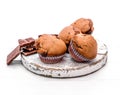 Homemade chocolate muffins on a wooden board Royalty Free Stock Photo