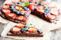 Homemade chocolate natural fruit pizza with berries Royalty Free Stock Photo