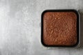 Homemade chocolate sponge cake on light grey table, top view. Space for text Royalty Free Stock Photo