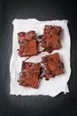 Homemade chocolate sweet brownies cakes with cherry and chocolate sauce or syrup on a dark background Royalty Free Stock Photo