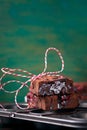 Homemade chocolate sweet brownies cakes with cherry and chocolate sauce or syrup on a dark background Royalty Free Stock Photo