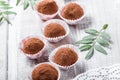 Homemade Chocolate truffles candy dessert on wooden background close up. Delicious chocolate praline with decor