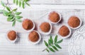 Homemade Chocolate truffles candy dessert on wooden background close up. Royalty Free Stock Photo