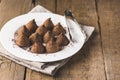 Homemade Chocolate Truffles With Cocoa Powder on a White Plate Old Wooden Background Tasty Candy Copy Space Royalty Free Stock Photo