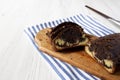 Homemade Chocolate and Vanilla Marble Cake on a rustic wooden board, side view. Copy space Royalty Free Stock Photo