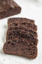 Homemade Chocolate Zucchini Bread on a rustic wooden board, side view. Close-up Royalty Free Stock Photo