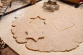 Homemade Christmas biscuits. Dough and cookie cutter on table, closeup