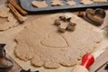 Homemade Christmas biscuits. Dough and cookie cutters on table