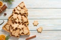 Homemade christmas cookies in christmas tree shaped bowl on light wooden background Royalty Free Stock Photo