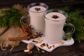 Homemade Christmas eggnog in cups. Traditional drink . Royalty Free Stock Photo