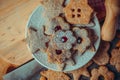 Homemade Christmas gingerbread and linzer cookies with jam, powdered, top flat view, instagram filetr, vintage