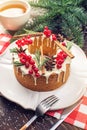 Homemade Christmas or New Year holiday berry cake decorated currants and rosemary. Concept of festive desserts