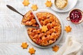 Homemade Christmas pie and star shaped cookies. Festive dessert concept. Royalty Free Stock Photo