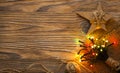 Homemade Christmas star with lights illuminated on a wooden back Royalty Free Stock Photo