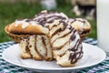 Homemade cinnabons cinnamon buns with cream cheese glaze and chocolate icing. Royalty Free Stock Photo