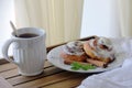 Homemade cinnabons cinnamon rolls with cream glaze Royalty Free Stock Photo