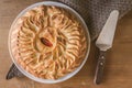 Homemade classical pie with vegetables top view on a wooden table