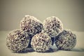 Homemade coconut rum balls on plate. Christmas sweets. Traditional homemade handmade Czech sweets. Royalty Free Stock Photo