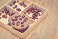 Homemade coffee soap with coffee beans in a wooden box Royalty Free Stock Photo