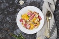 Colored papardelle with chicken, bacon and mushrooms