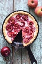 Homemade comfort food. Rustic apple rose pie in cast iron pan wi Royalty Free Stock Photo