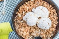 Homemade cooked rhubarb and apple crumble with oatmeal and vanilla ice cream Royalty Free Stock Photo