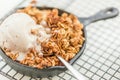 Homemade cooked rhubarb and apple crumble with oatmeal and vanil Royalty Free Stock Photo