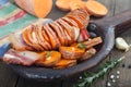 Homemade Cooked Sweet Potato with fried bacon and herbs Royalty Free Stock Photo