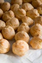 Top view of apetizing profiteroles. Homemade cookery and bakery