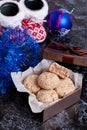 Homemade cookies in a brown gift box with spices