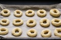 Homemade cookies. Cottage cheese rings on a baking sheet, healthy sweets. Bake at home. Family traditions. Selective