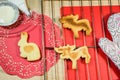 Homemade cookies on the grate and red doilies