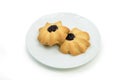 Homemade cookies with jam on plate isolated