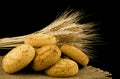 Homemade cookies and spikelets of wheat isolated on black background close-up Royalty Free Stock Photo