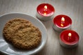 Homemade cookies surrounded by candles, hygge time
