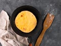 Homemade corn flatbread meal on frying pan linen cloth. Handmade mexican tortilla for wrapping. Traditional latin recipe Royalty Free Stock Photo