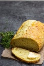 Homemade corn loaf on black stone background