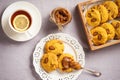 Homemade corn shortbread cookies with almond and caramel sauce.