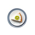 Homemade cottage cheese cake with kiwi fruit and cream on a plate isolated on white background with clipping path Royalty Free Stock Photo