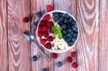 A homemade cottage cheese and fresh ripe berries for breakfast. Delicious and healthy dessert. ÃÂ¡lose-up. Top view Royalty Free Stock Photo