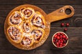 Homemade cranberry and orange swirl buns wuth glaze.