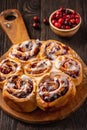 Homemade cranberry and orange swirl buns wuth glaze.