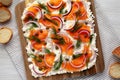 Homemade Cream Cheese Lox Bagel Board with Salmon on a white wooden background, top view. Flat lay, overhead, from above Royalty Free Stock Photo