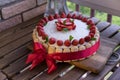 Homemade cream layer cake, fresh, colorful, and delicious dessert with juicy strawberries, sweet whipped cream and cream