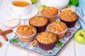 Homemade crispy apple muffins with walnuts and cinnamon Royalty Free Stock Photo